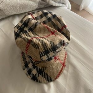 Burberry Paperboy authentic Hat. Barely used. Too big for my tiny head.